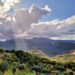 A view of the Madonie Mountains with a streak of sun bursting through the clouds; Pollina, Sicily (Italy)