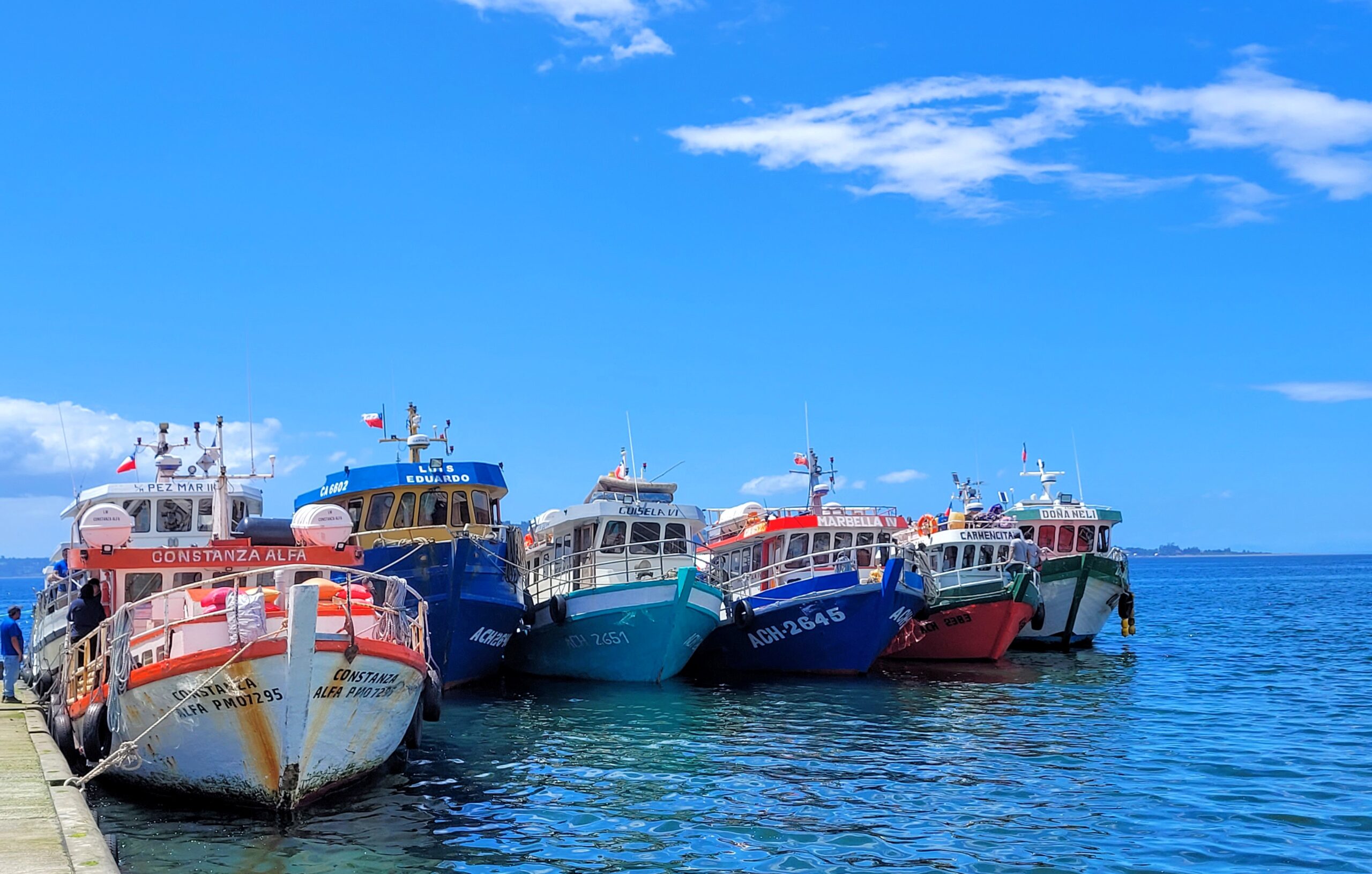 'Ferry' boats waiting to take passengers to remote islands; Quinchao Island, Chile