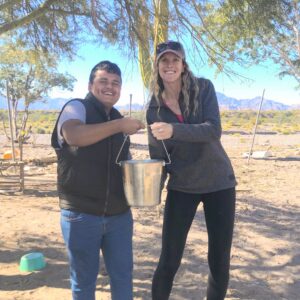 Pablo helped me milk a cow; Loreto