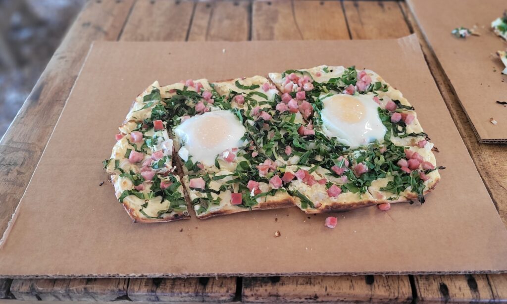 Flammkuchen, a 'German pizza' from Piroschka’s in Oranjezicht City Farm Market; Cape Town, South Africa