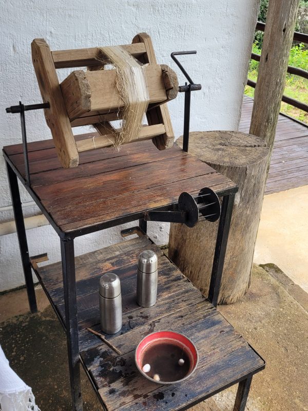 Manual silk spinning wheel at Africa Silks Farm; Graskop, South Africa