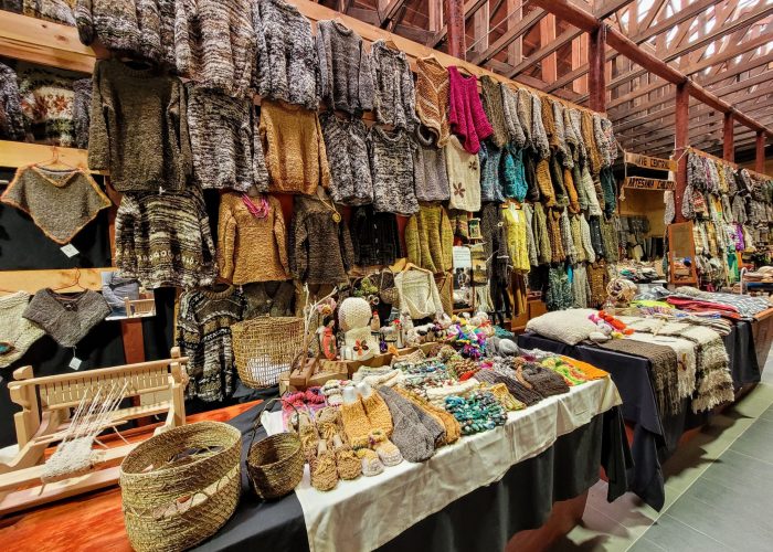 Floor to ceiling display of artisanal products at Feria Artesanal y Mercado Campesino Lillo; Chiloé Island, Chile