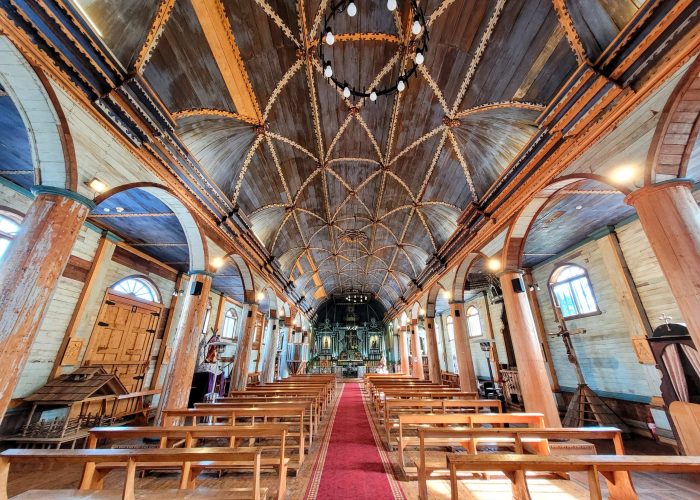 A wide angle view from the floor to ceiling inside Achao Church; Quinchao Island, Chile